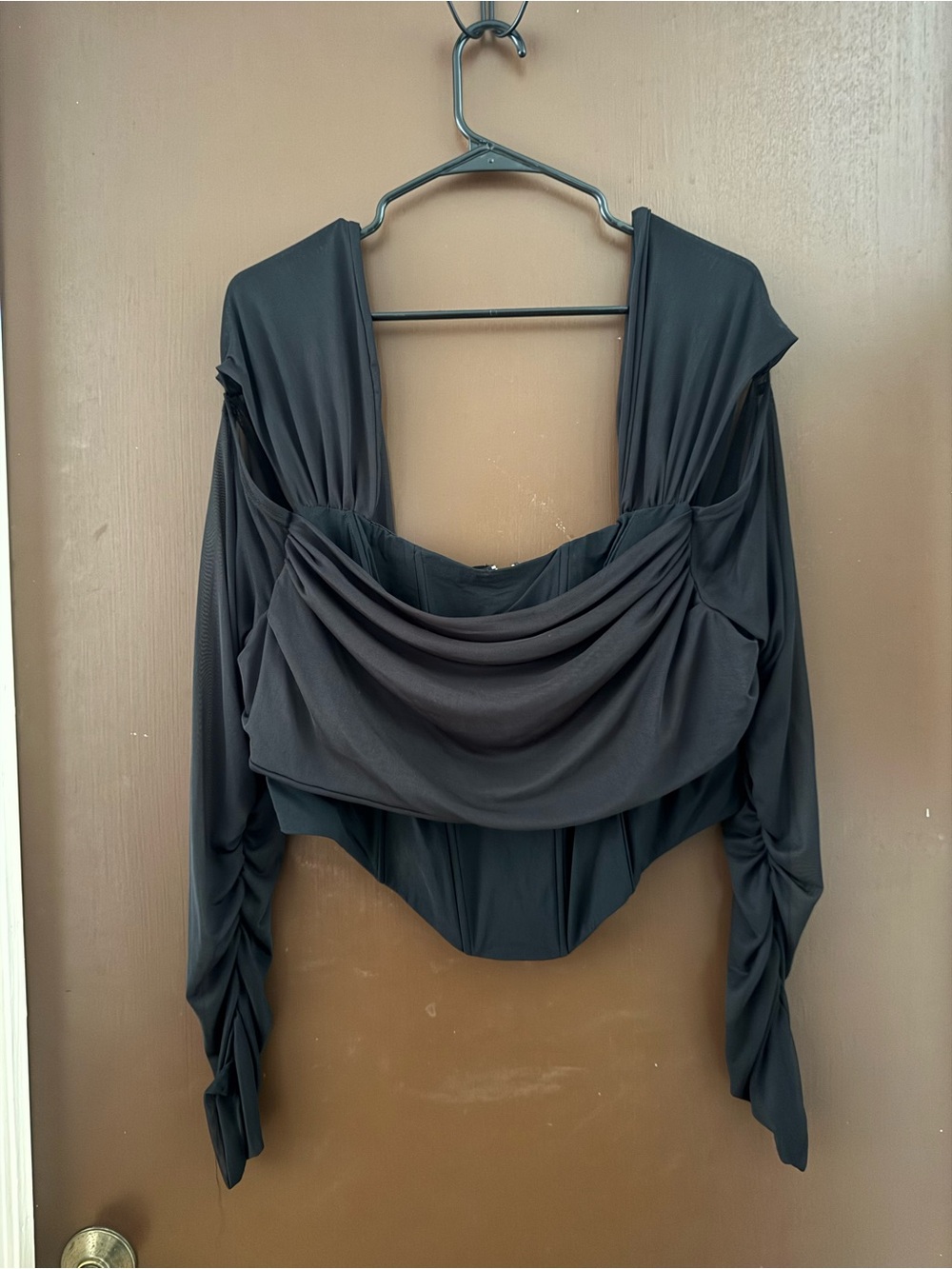 Black long sleeve corset top with zipper back closure